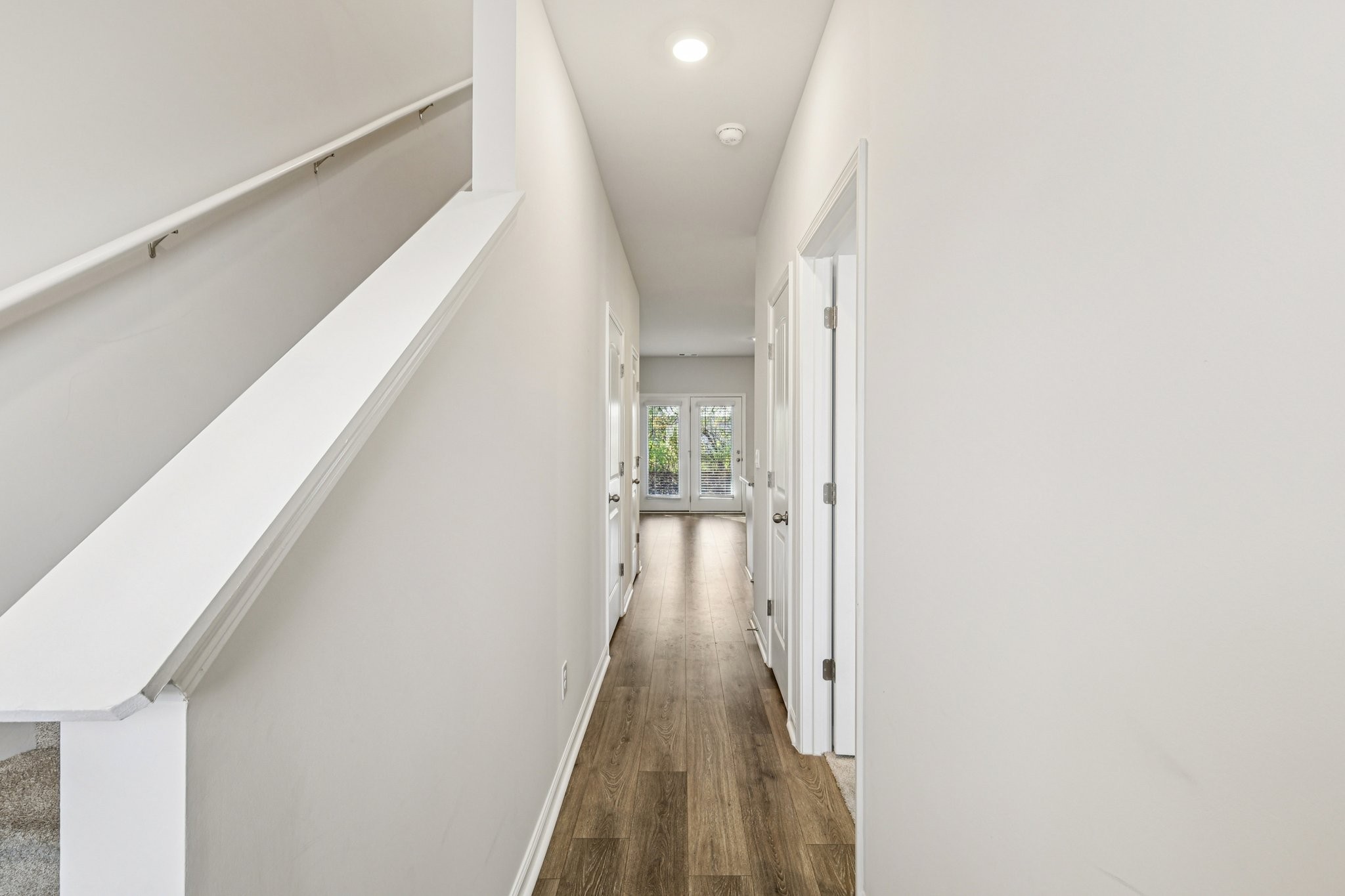 160 Cecil Road Lebanon, TN 37087 - Photo 3 of 23 a view of a hallway with wooden floor and staircase