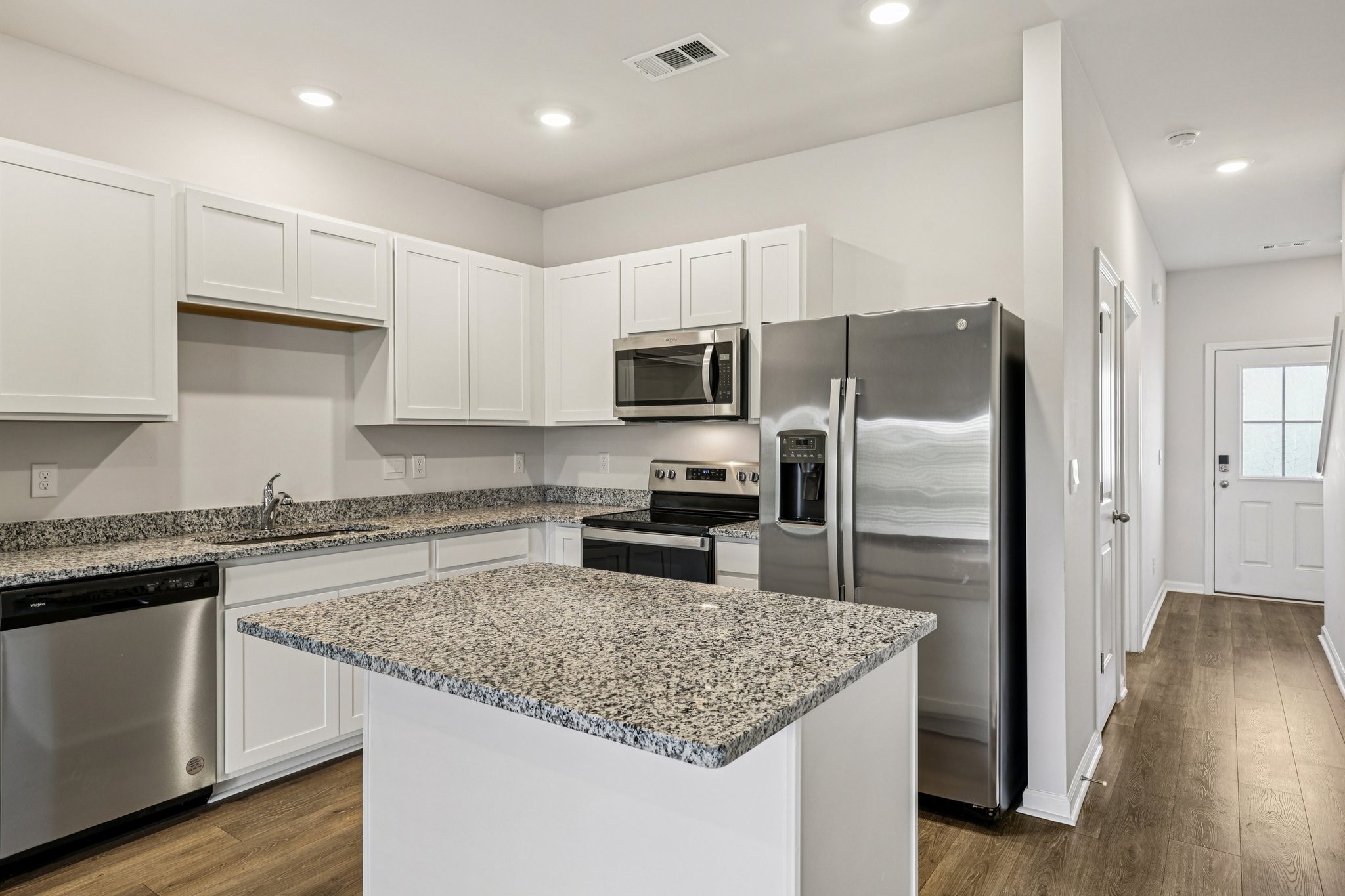 160 Cecil Road Lebanon, TN 37087 - Photo 8 of 23 a kitchen with granite countertop kitchen island wooden cabinets and stainless steel appliances