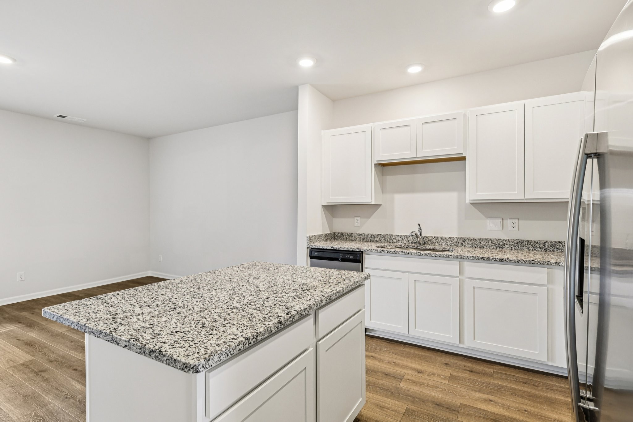 160 Cecil Road Lebanon, TN 37087 - Photo 9 of 23 a kitchen with granite countertop white cabinets and a stove