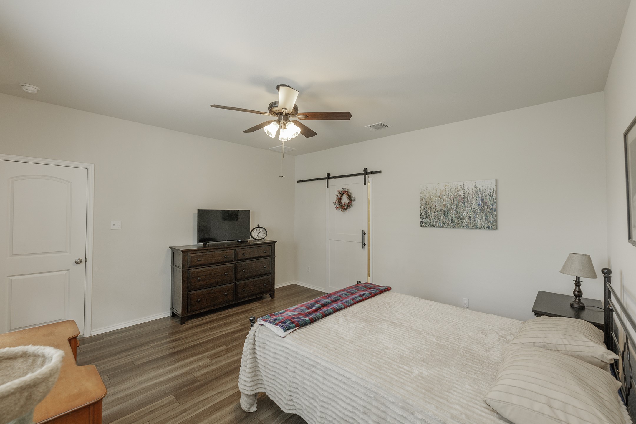 125 Janice Road Taylor, TX 76574 - Photo 14 of 26 Interior space featuring wood-finish flooring and light-toned walls