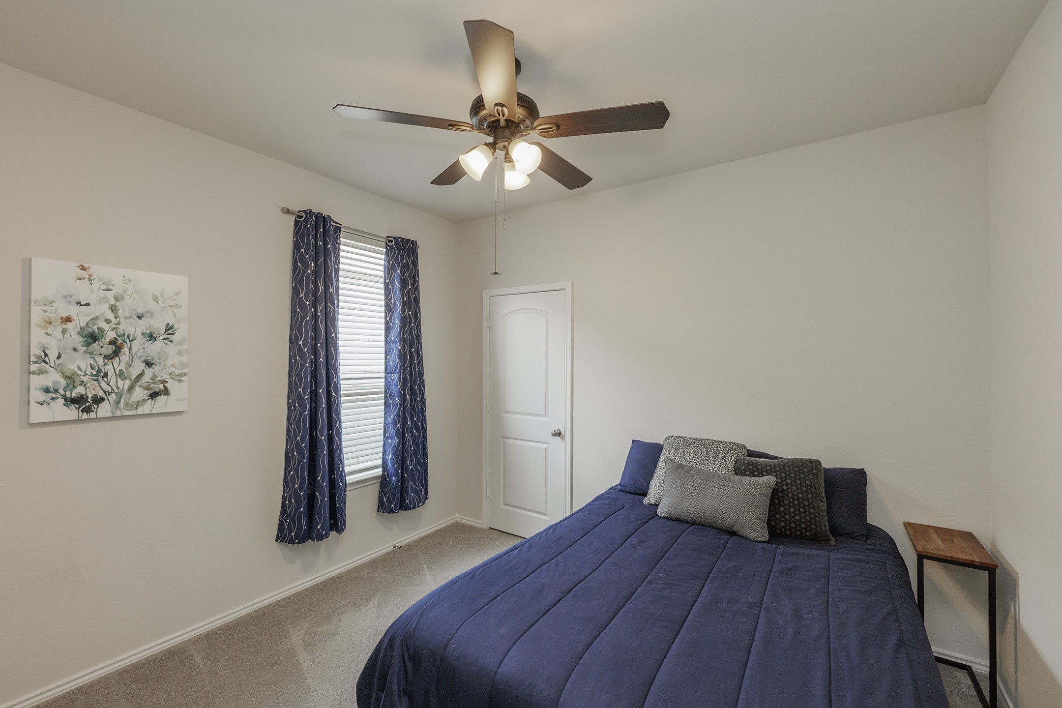 125 Janice Road Taylor, TX 76574 - Photo 17 of 26 Recessed lighting illuminates neutral walls and gray carpeting