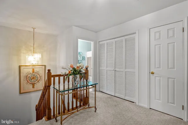 a view of a hallway with windows