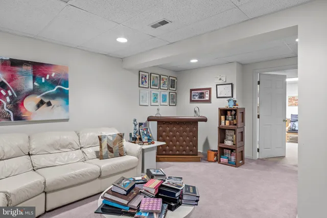 a living room with furniture and a couch