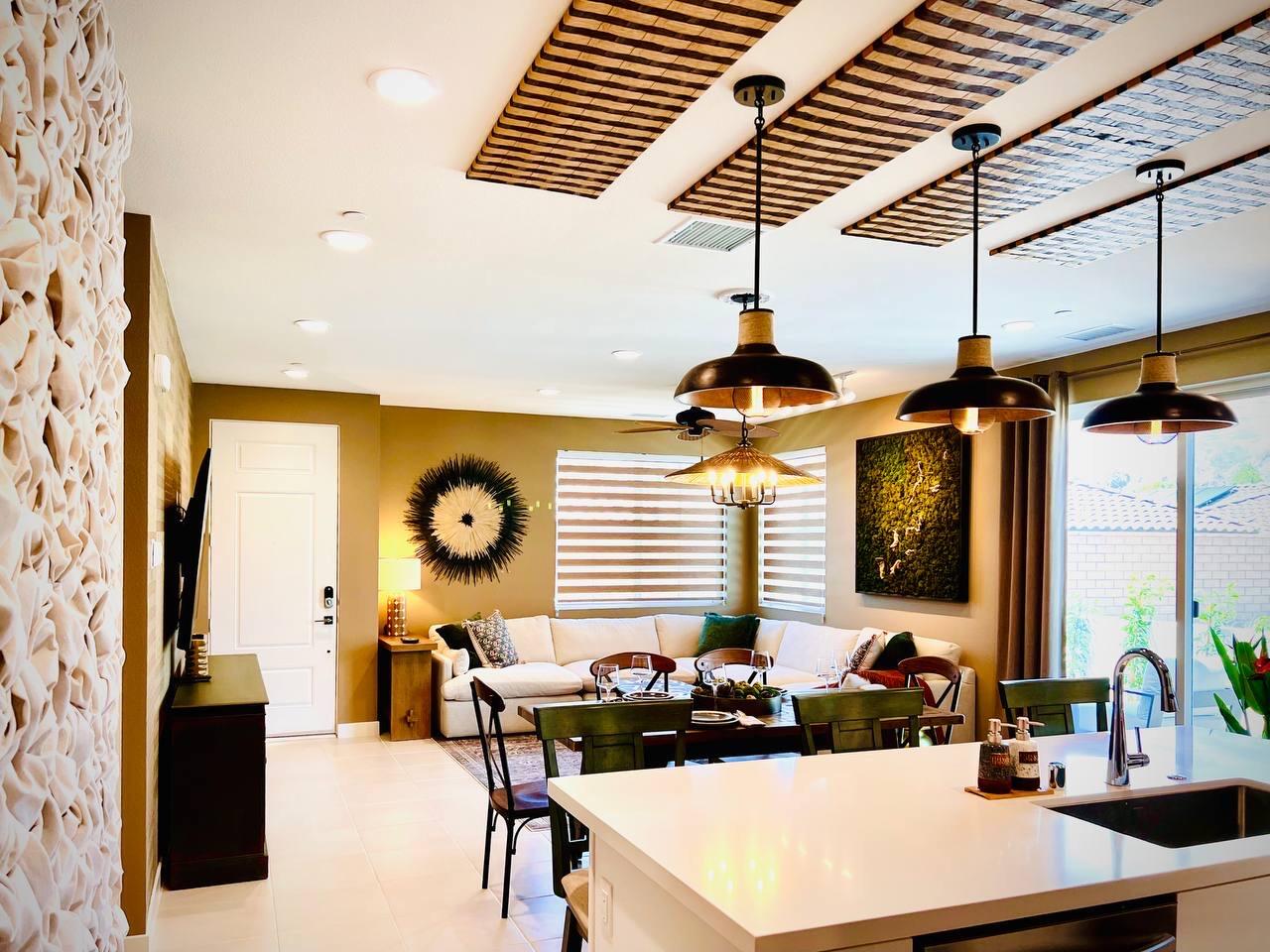 a dining room with furniture and window