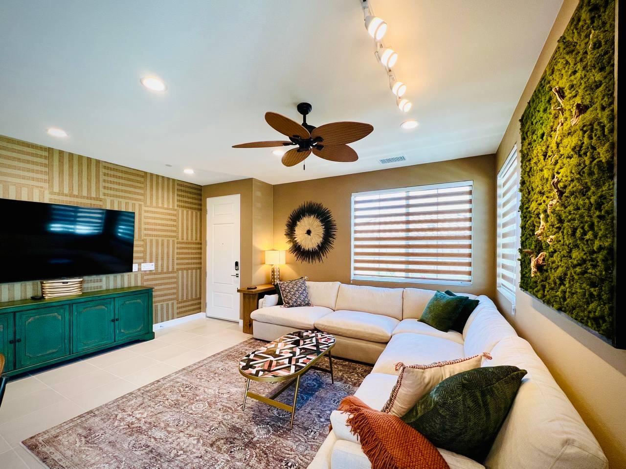 80269 Redstone Way La Quinta, CA 92253 - Photo 15 of 35 a living room with furniture and a flat screen tv