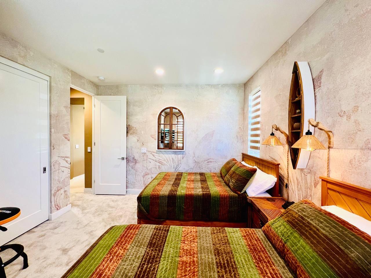 80269 Redstone Way La Quinta, CA 92253 - Photo 19 of 35 a bed room with a bed and a couch