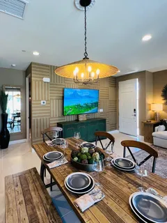 a room with furniture and a swimming pool