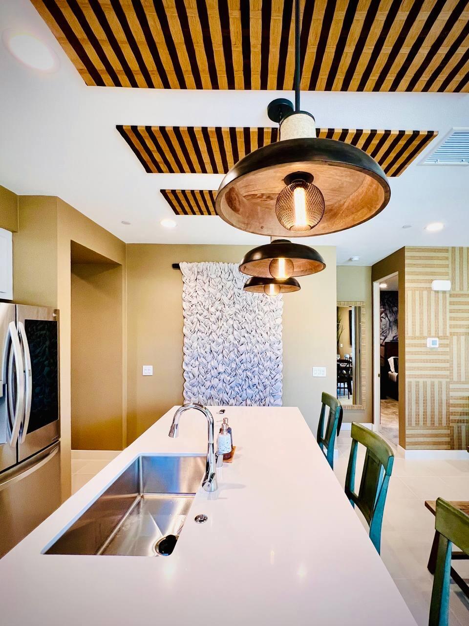 80269 Redstone Way La Quinta, CA 92253 - Photo 4 of 35 a kitchen with a sink and a refrigerator