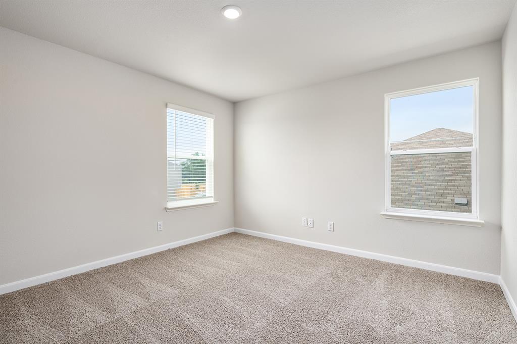 4256 Lava Frst Drive Dallas, TX 75241 - Photo 11 of 20 an empty room with a window