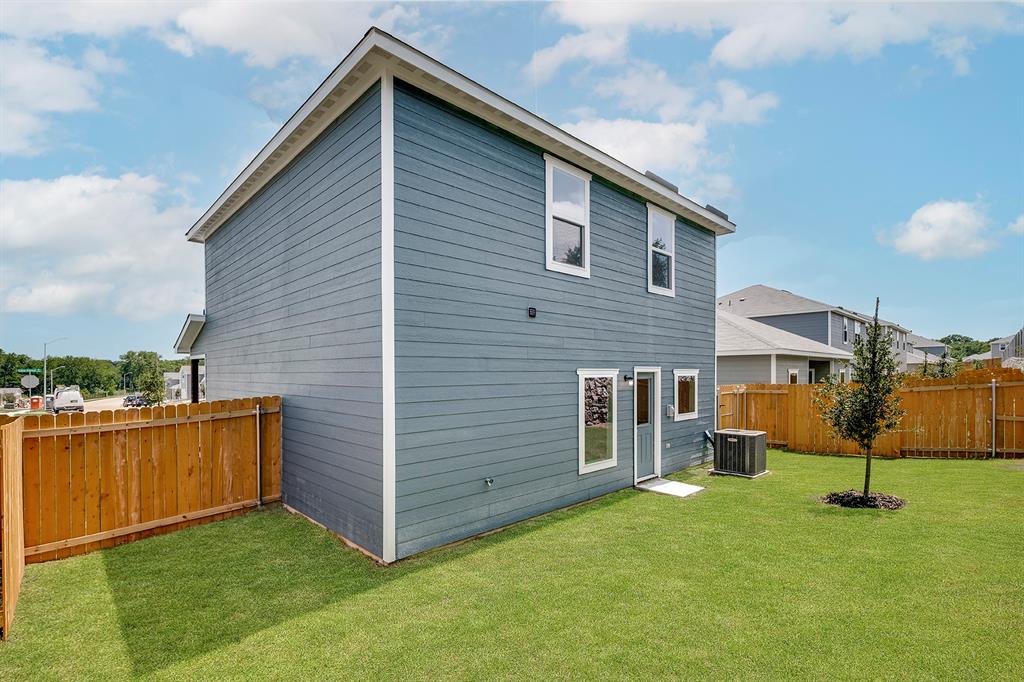 4256 Lava Frst Drive Dallas, TX 75241 - Photo 3 of 20 a view of a house with a yard