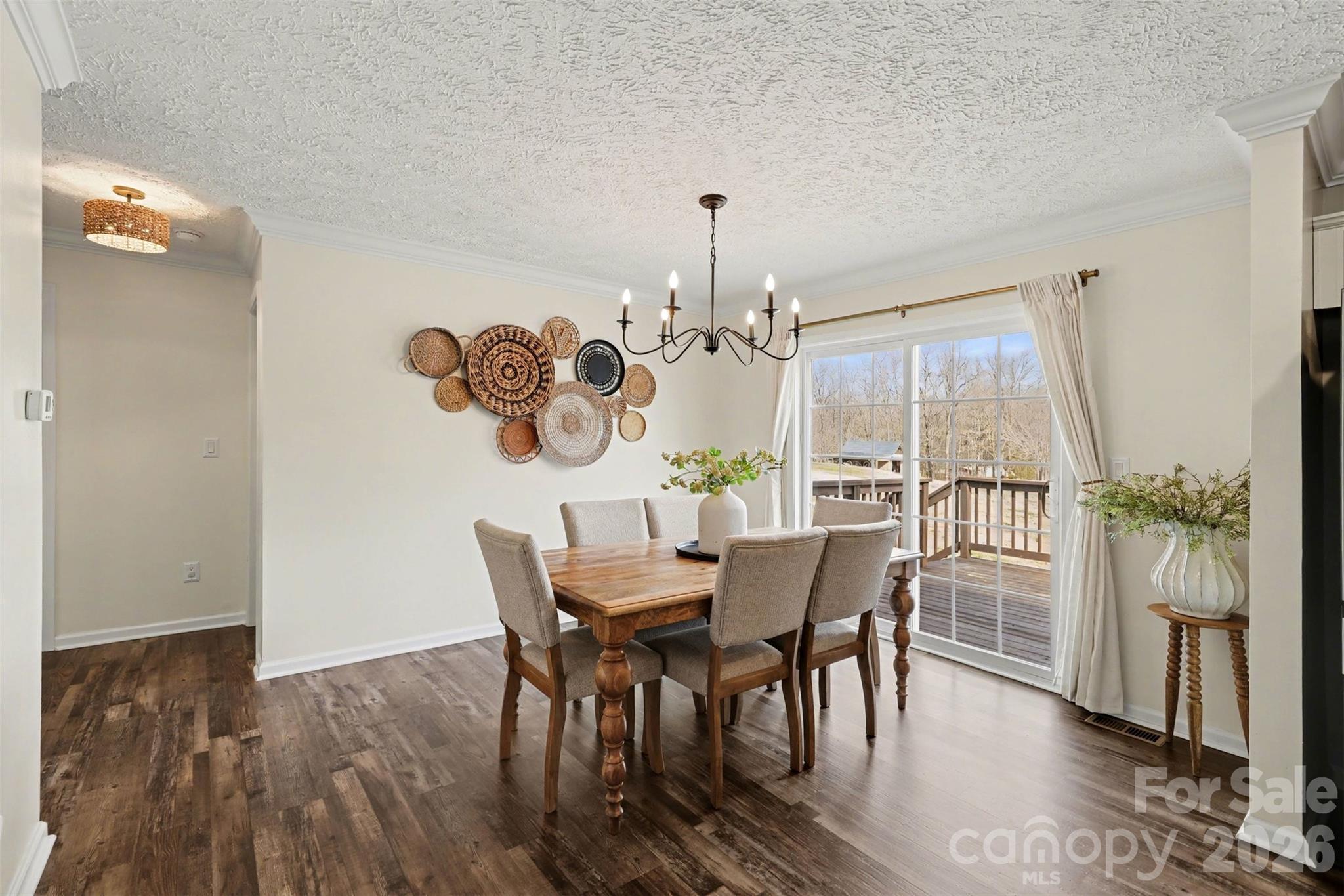 193 Back Acres Lane Kannapolis, NC 28081 - Photo 13 of 23 a view of a dining room with furniture window and wooden floor