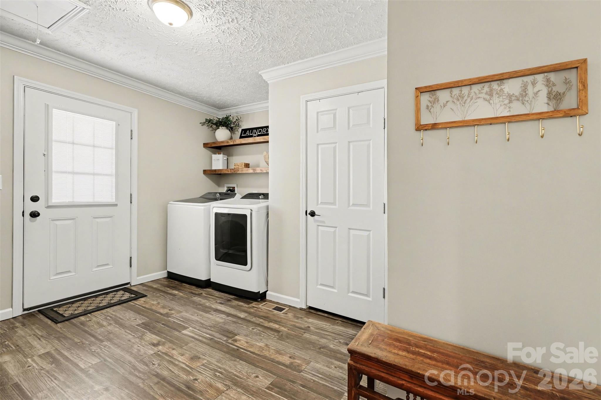 193 Back Acres Lane Kannapolis, NC 28081 - Photo 17 of 23 a view of a room with wooden floor cabinet and windows