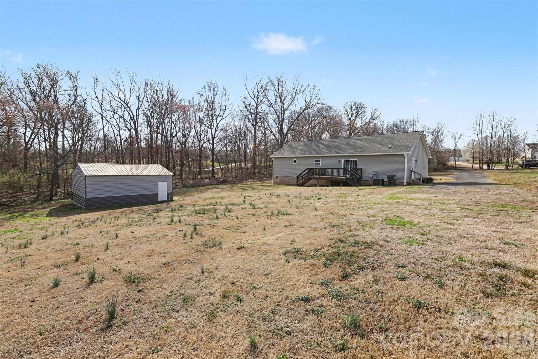 193 Back Acres Lane Kannapolis, NC 28081 - Photo 19 of 23 a view of a house with a yard and covered with snow