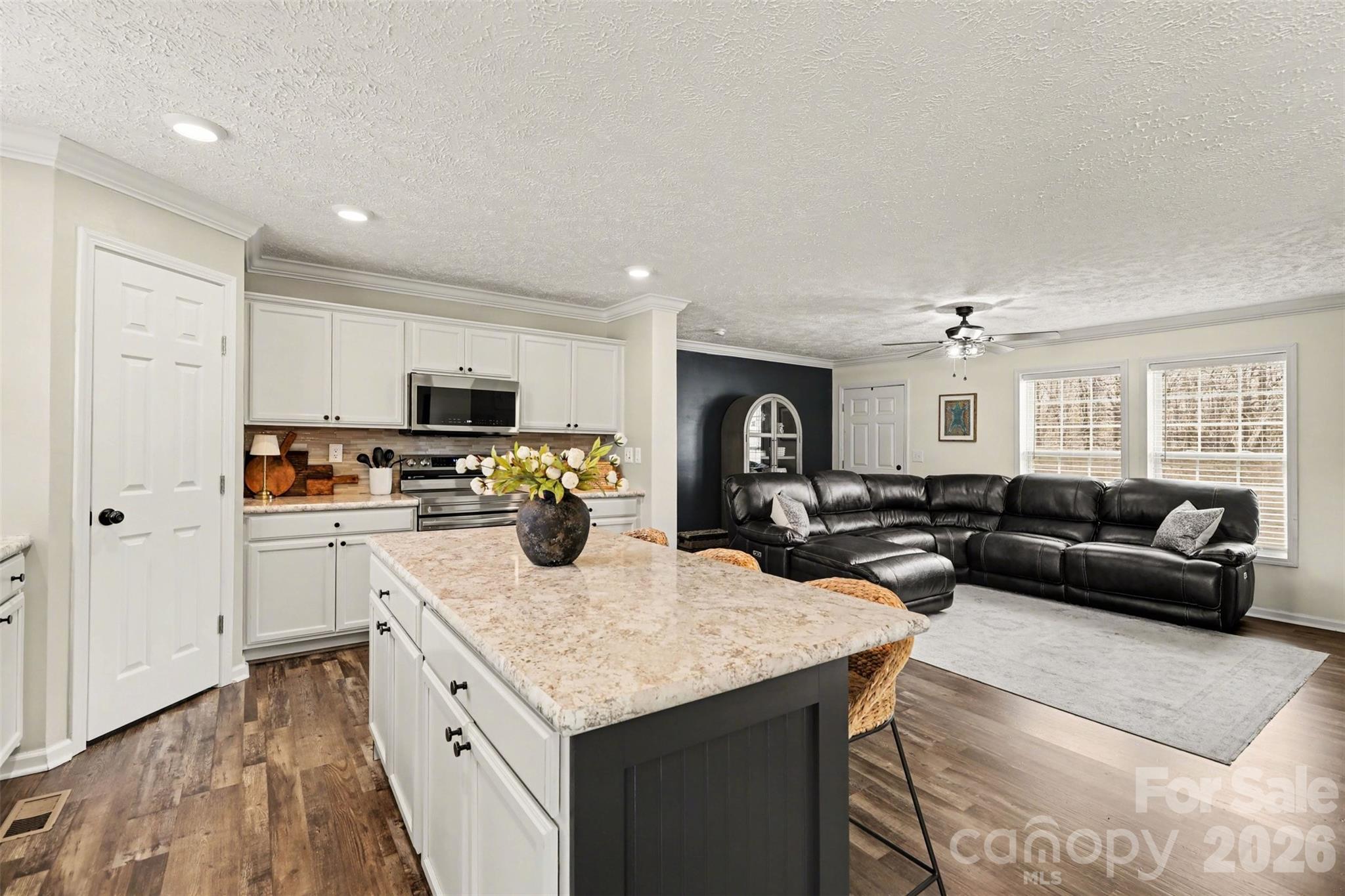 193 Back Acres Lane Kannapolis, NC 28081 - Photo 5 of 23 a kitchen with sink refrigerator and microwave