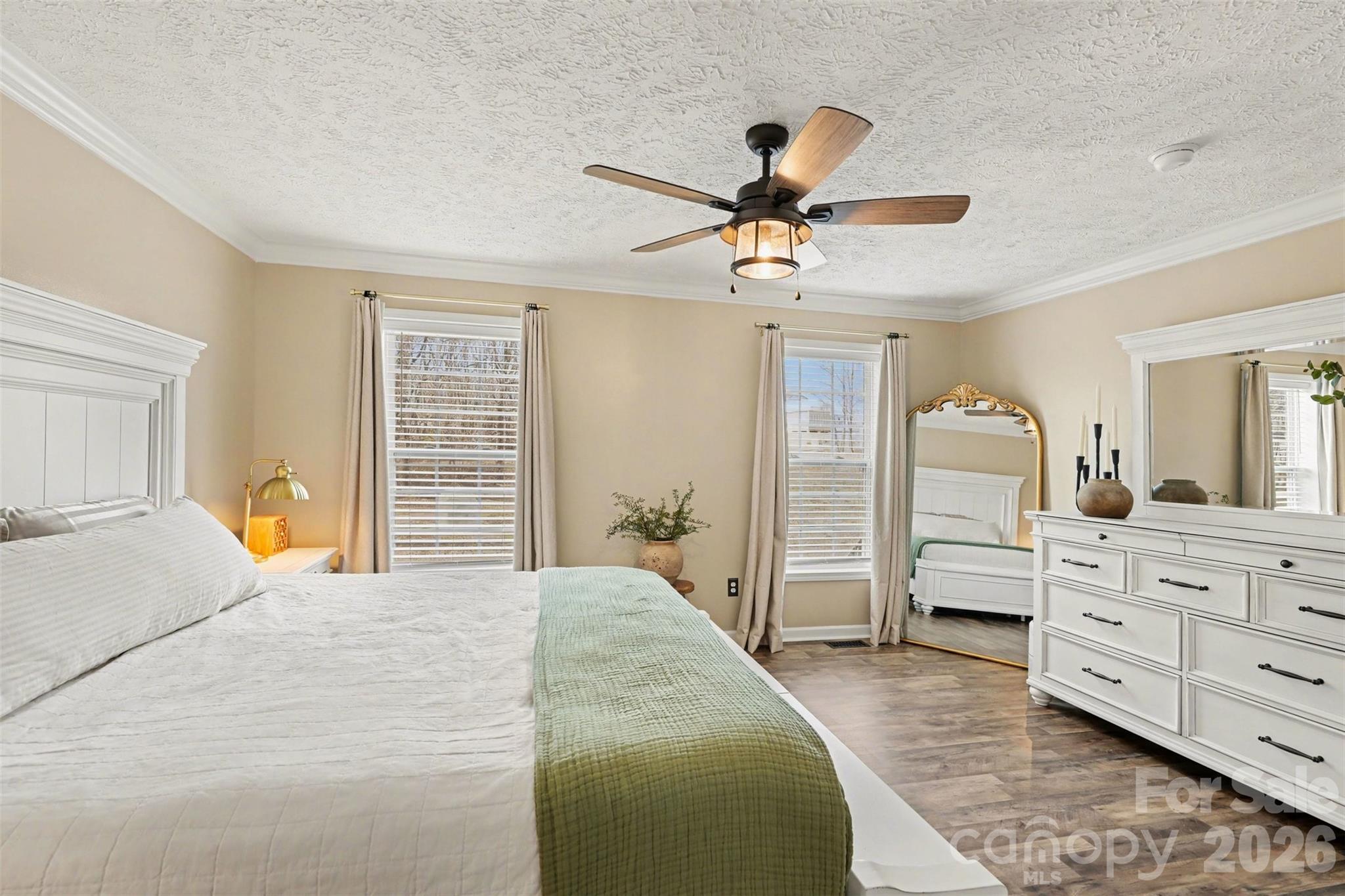 193 Back Acres Lane Kannapolis, NC 28081 - Photo 8 of 23 a bedroom with a large bed and closet