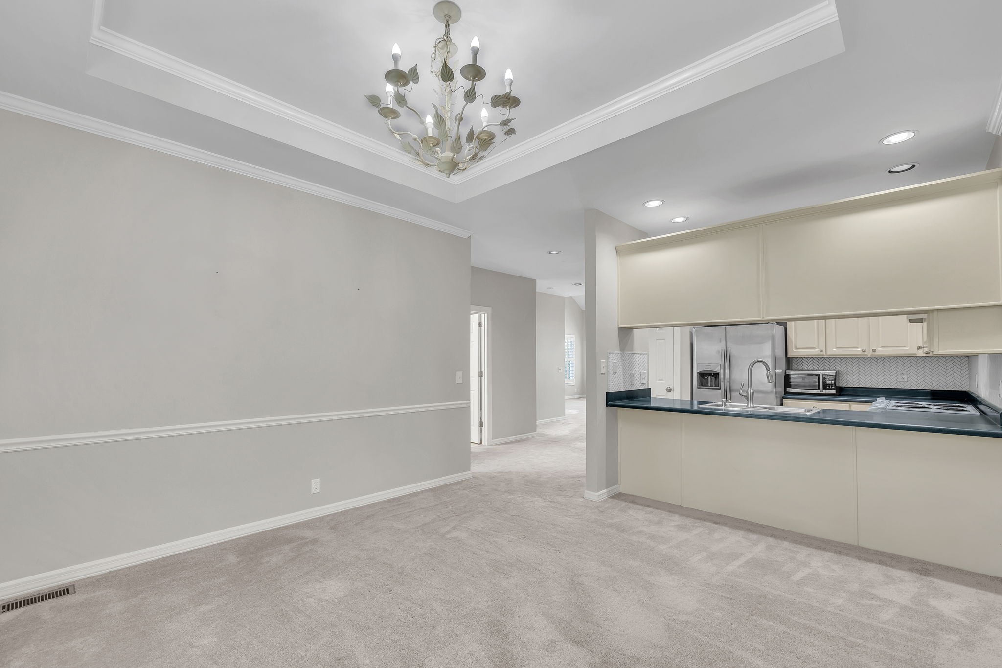 104 Hicks Road Nashville, TN 37221 - Photo 19 of 41 a kitchen with stainless steel appliances a refrigerator sink and cabinets