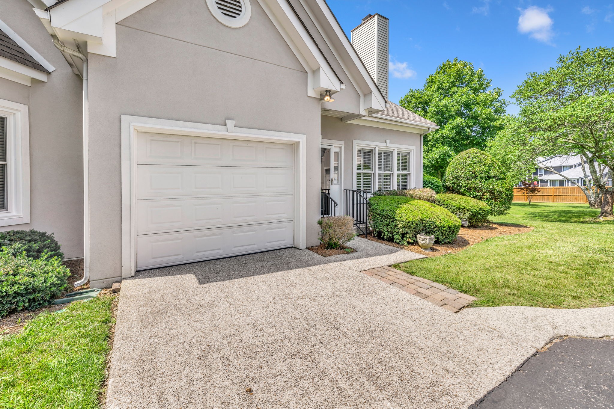 104 Hicks Road Nashville, TN 37221 - Photo 6 of 41 a front view of a house with garden