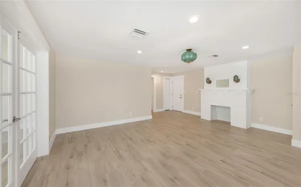 a view of cabinets with wooden floor