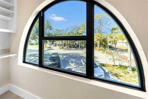 a kitchen with a refrigerator sink and cabinets