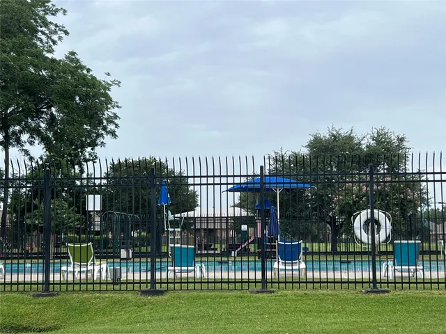 a view of a garden and deck
