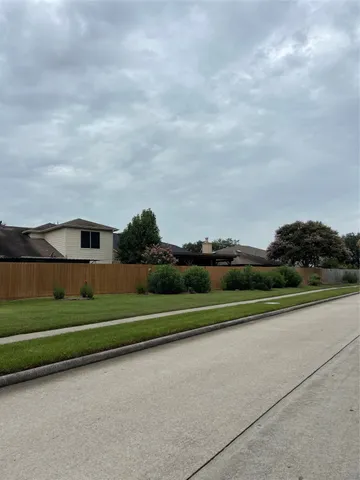 a view of green field with clear sky