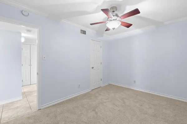 a view of an empty walk in closet