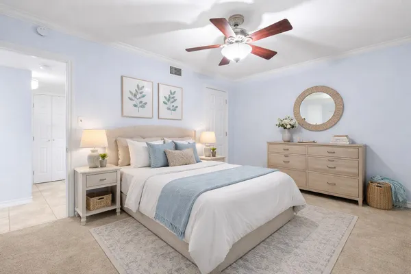 a bedroom with a bed and a closet