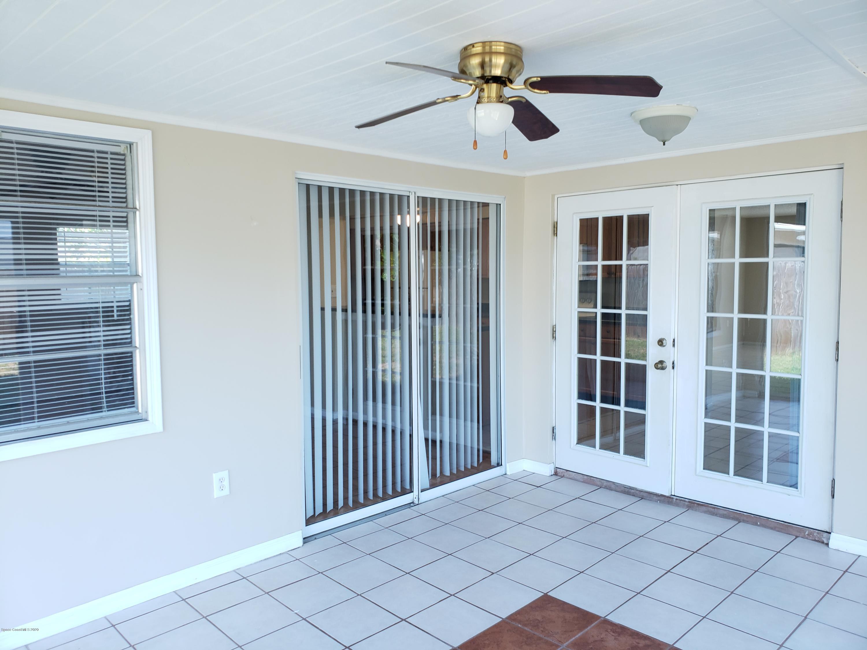 284 Jablo Avenue Cocoa, FL 32927 - Photo 17 of 20 a view of empty room with windows