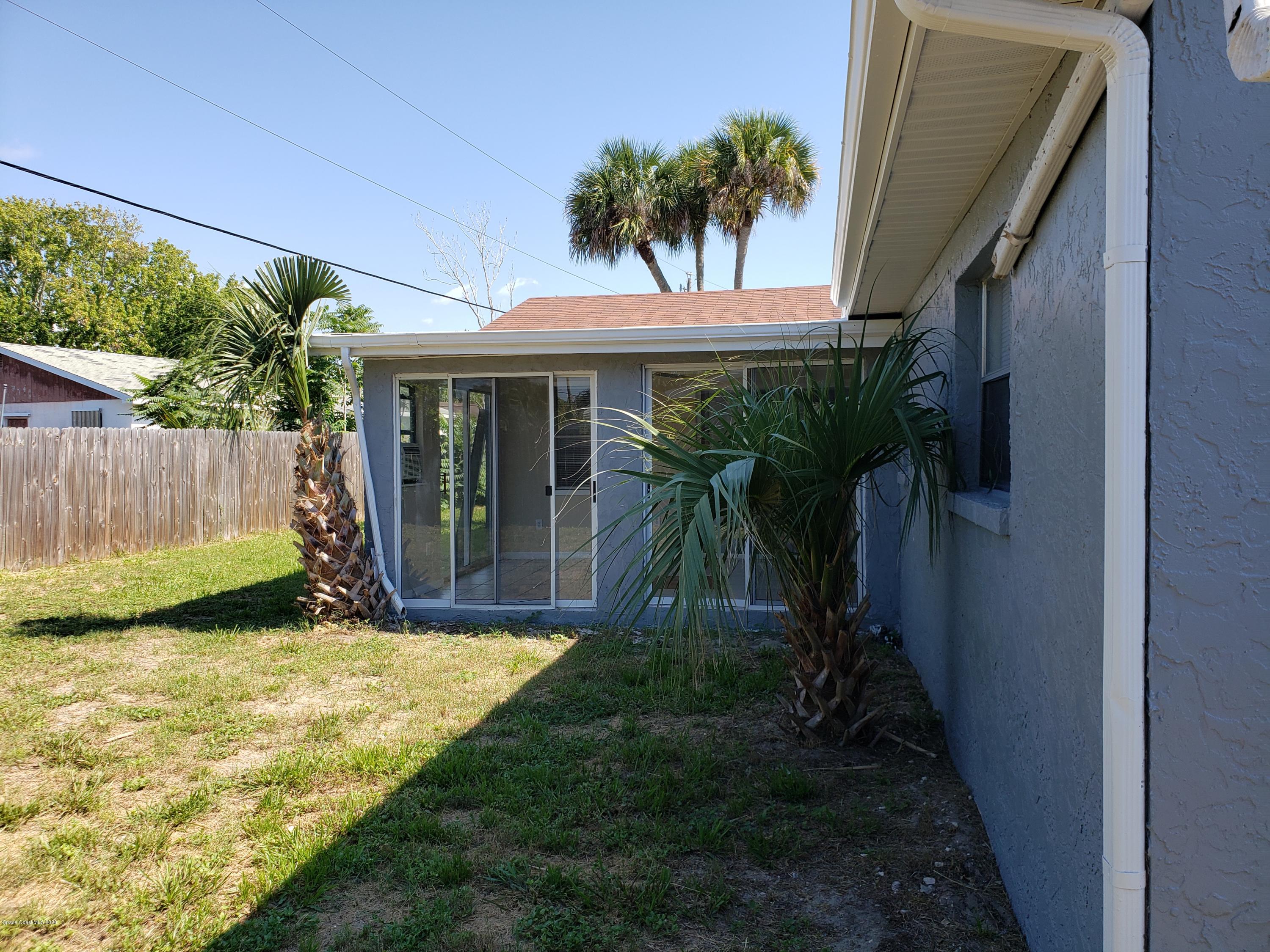 284 Jablo Avenue Cocoa, FL 32927 - Photo 19 of 20 a view of a house with backyard and garden