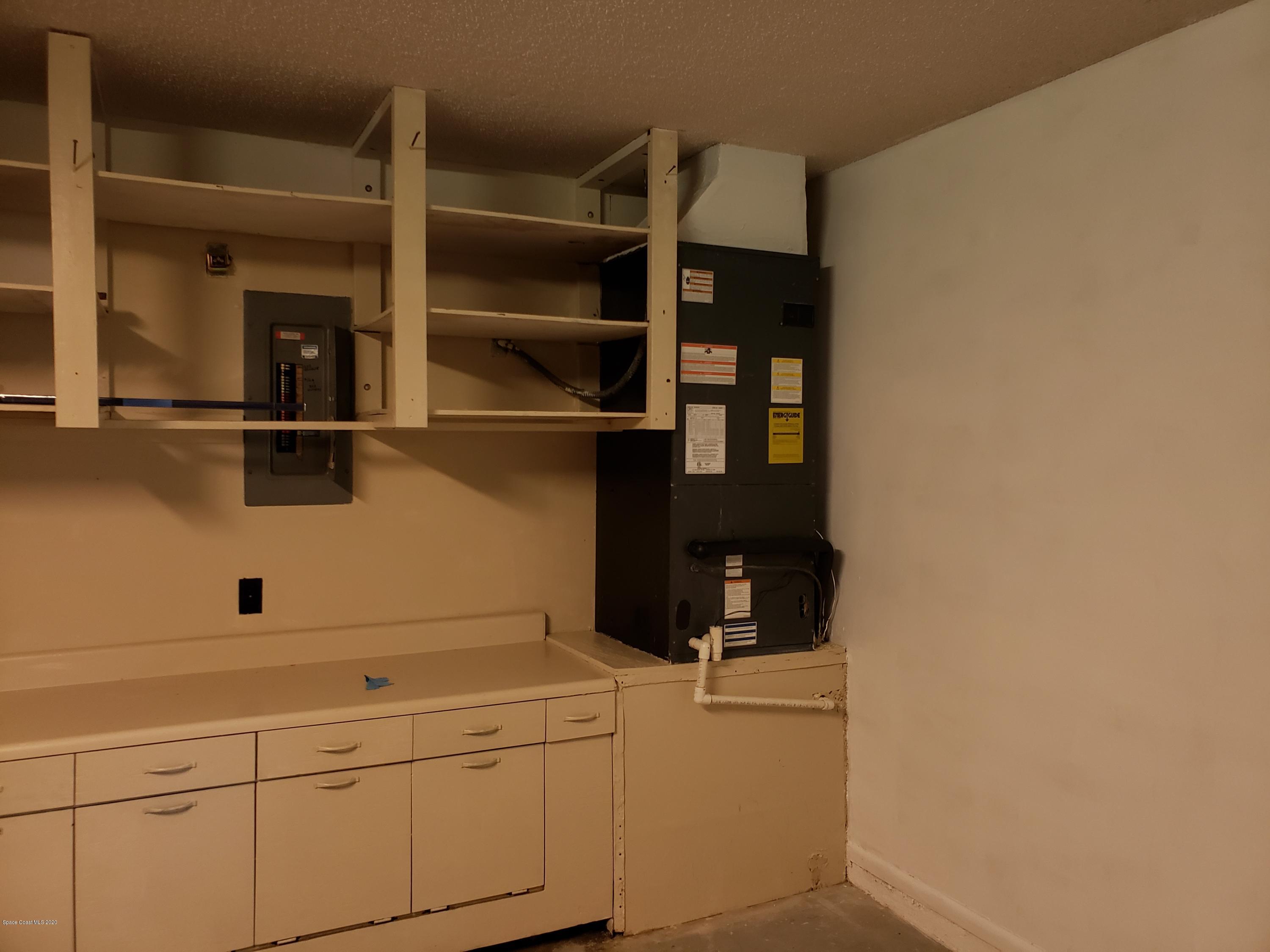 284 Jablo Avenue Cocoa, FL 32927 - Photo 20 of 20 a close view of a closet and utility room