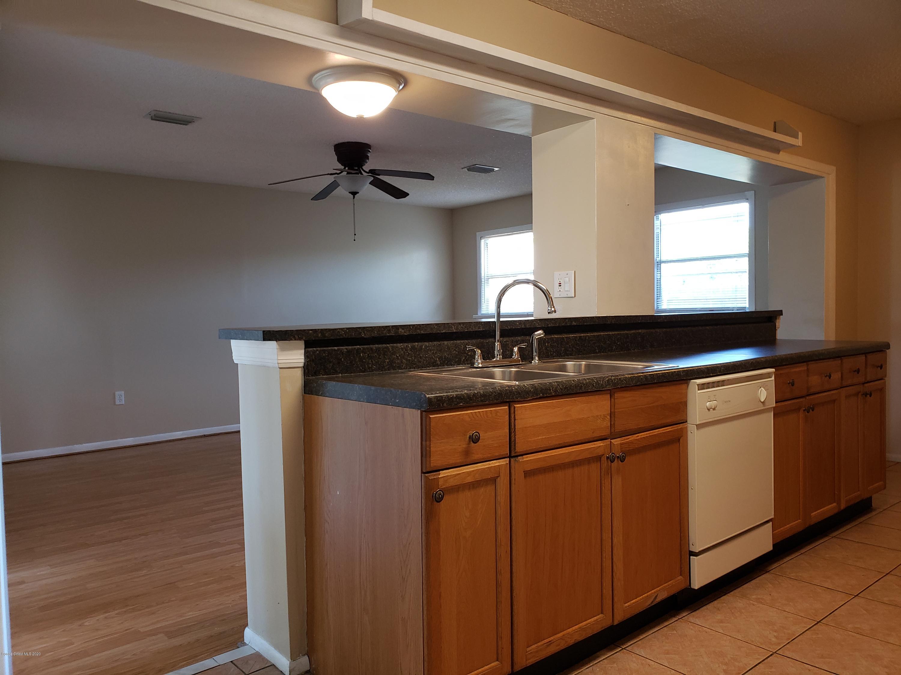 284 Jablo Avenue Cocoa, FL 32927 - Photo 8 of 20 a bathroom with a sink and a mirror