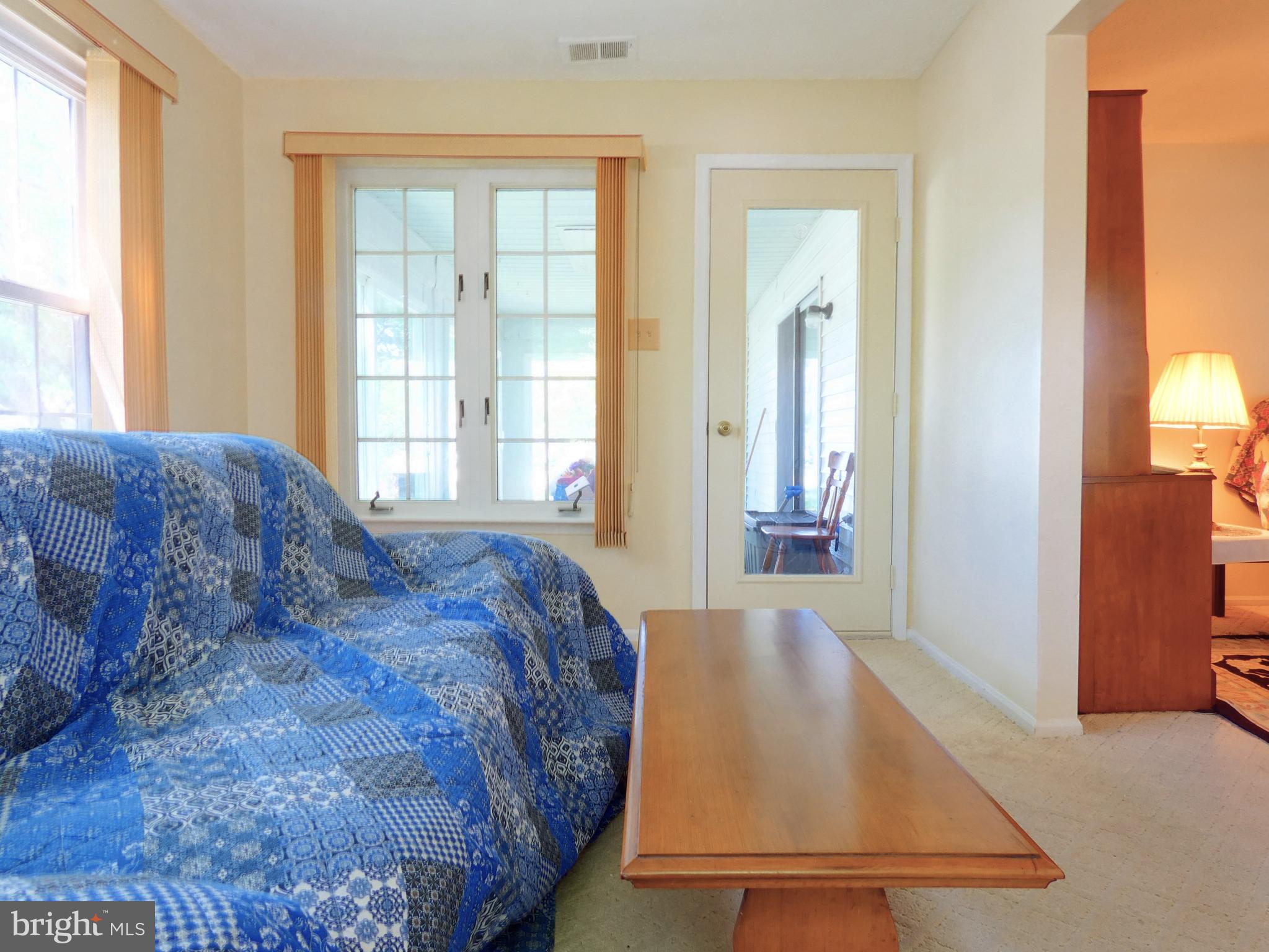 227 Lantern Place Tuckerton, NJ 08087 - Photo 19 of 33 a bed sitting in a spacious bedroom next to a window