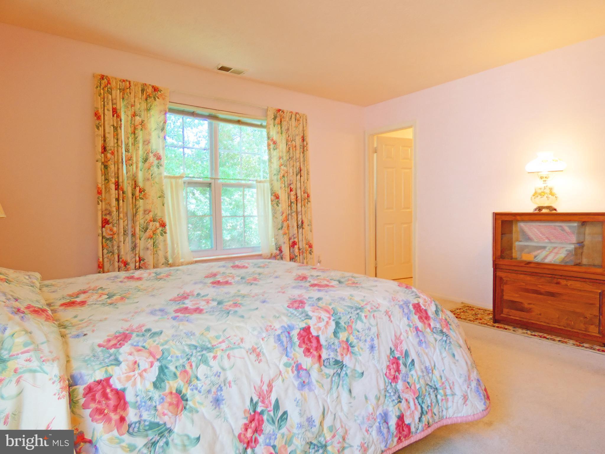 227 Lantern Place Tuckerton, NJ 08087 - Photo 22 of 33 a bedroom with a bed and a dresser