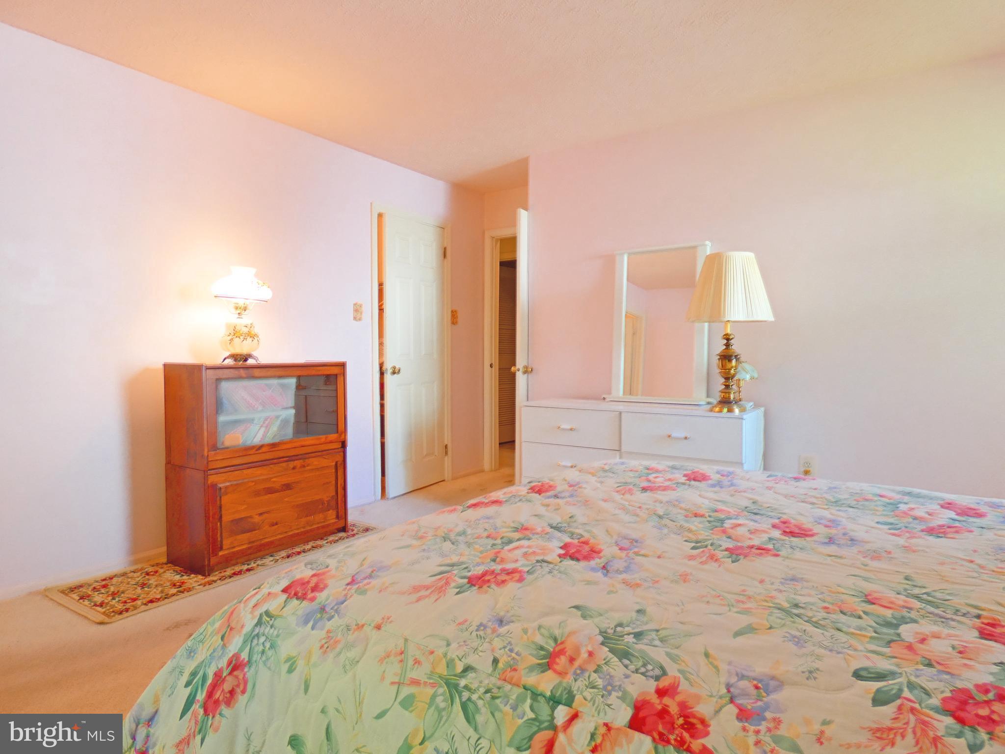 227 Lantern Place Tuckerton, NJ 08087 - Photo 23 of 33 a bedroom with a bed and a dresser