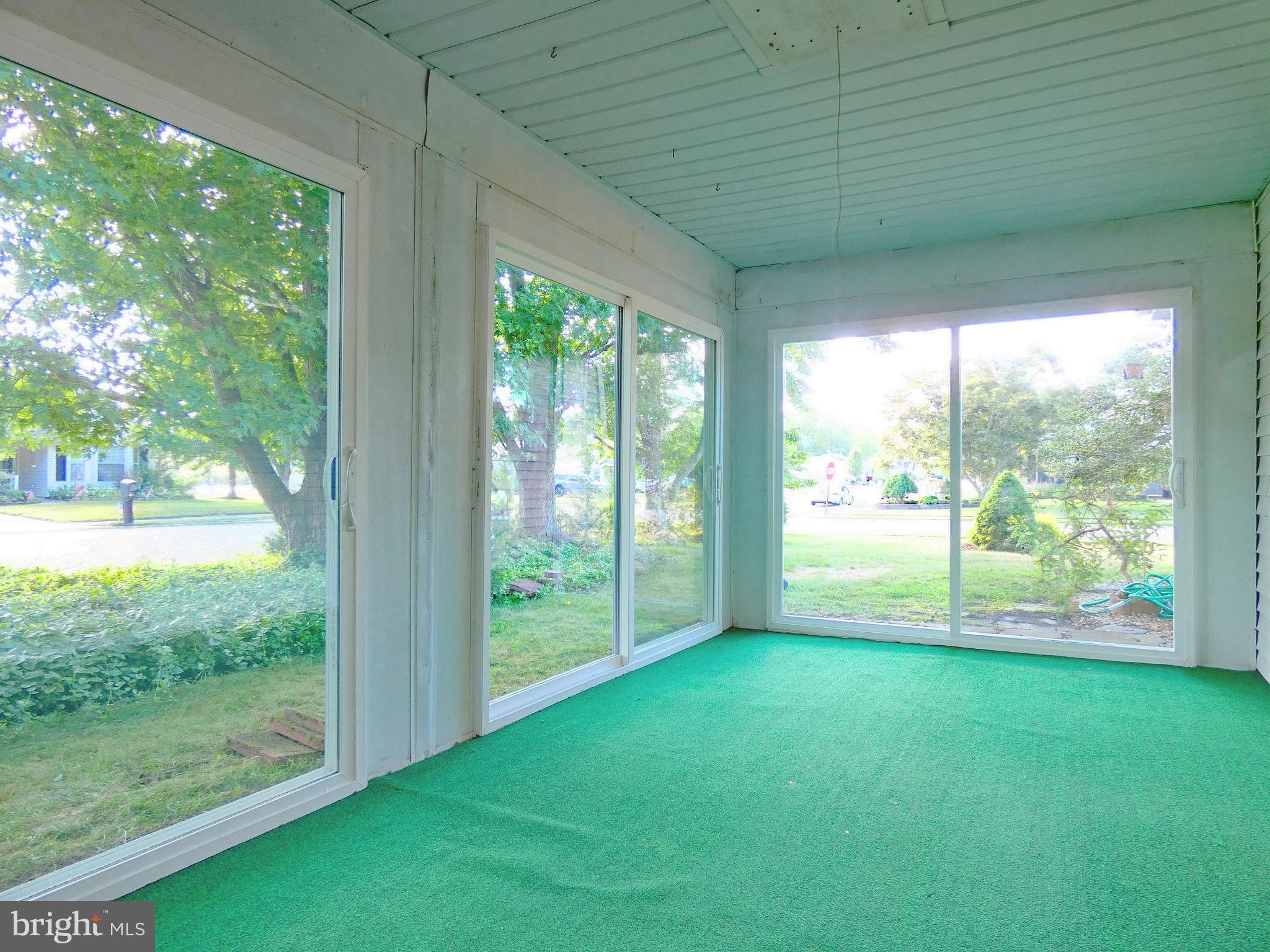 227 Lantern Place Tuckerton, NJ 08087 - Photo 32 of 33 a view of open room with green walls