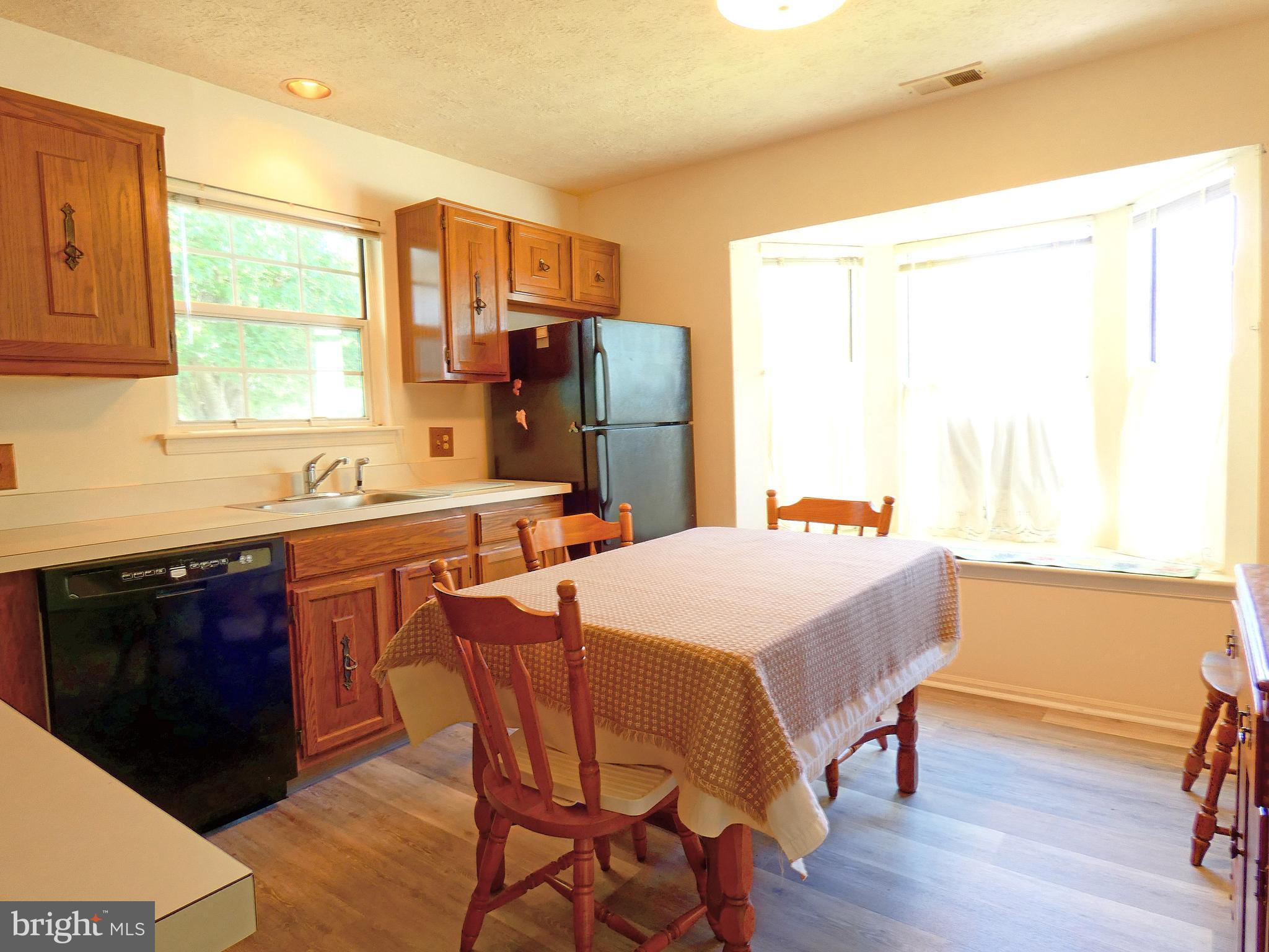 227 Lantern Place Tuckerton, NJ 08087 - Photo 7 of 33 a bedroom with a bed and a table