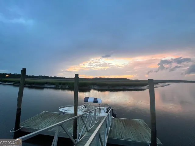 a view of a lake from a balcony