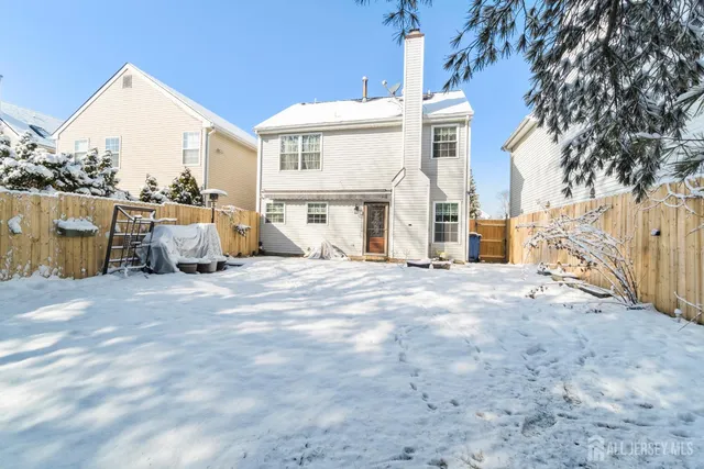 a view of a house with a snow