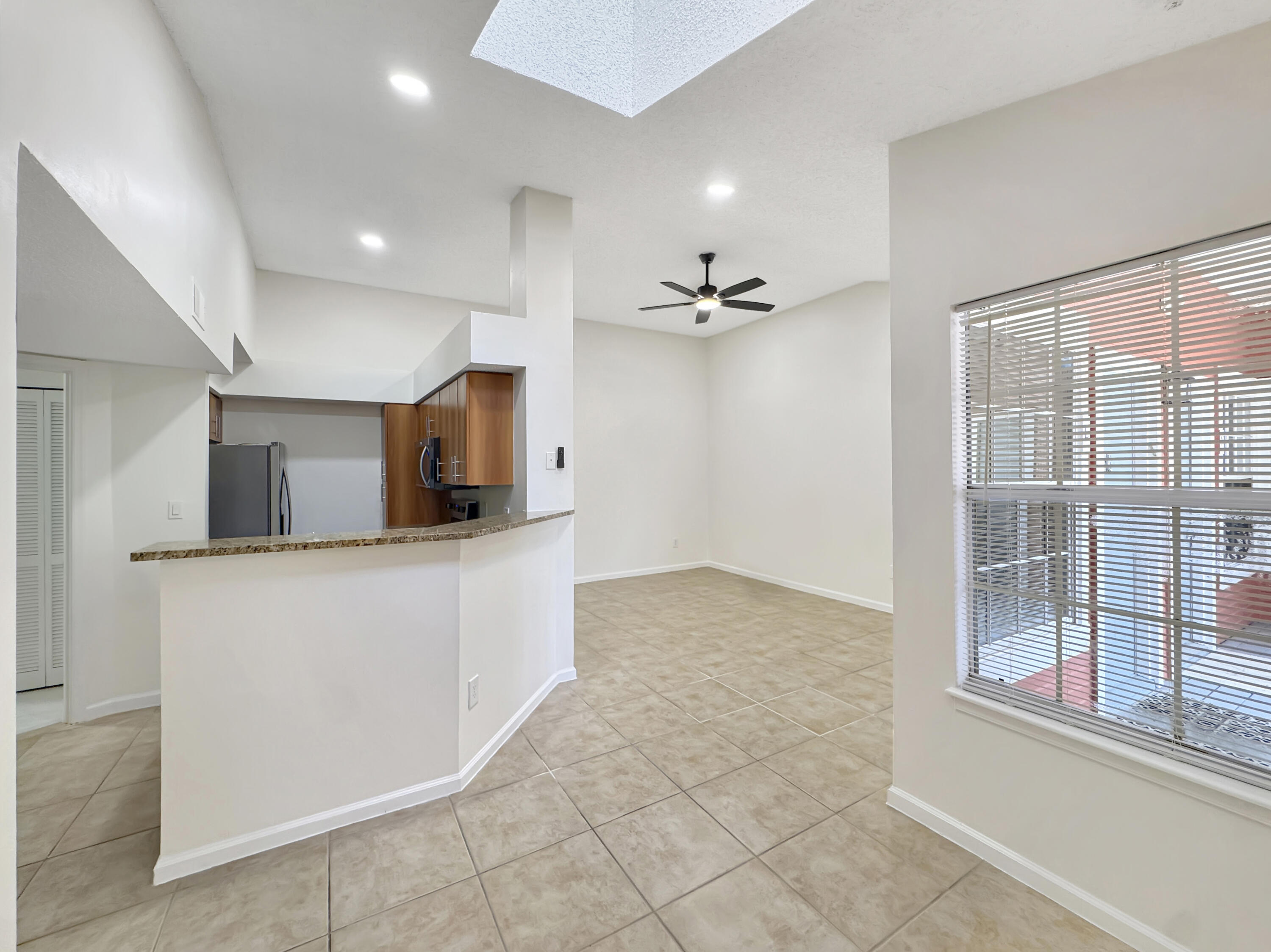 1335 Crystal Way, Unit L Delray Beach, FL 33444 - Photo 7 of 21 Dining Room to Living Room