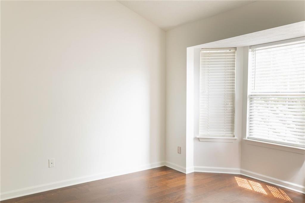340 Timber Gate Court Lawrenceville, GA 30045 - Photo 14 of 26 a view of a small space with wooden floor and a window