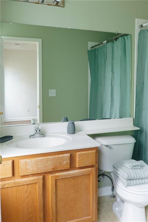 340 Timber Gate Court Lawrenceville, GA 30045 - Photo 16 of 26 a bathroom with a granite countertop sink and a mirror