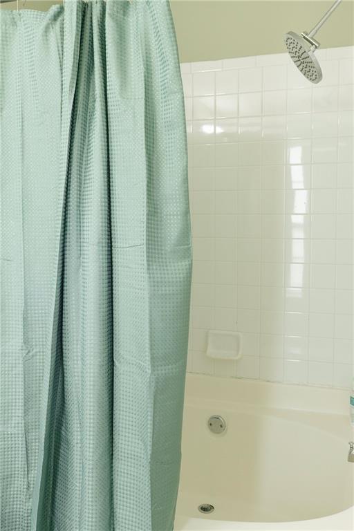 340 Timber Gate Court Lawrenceville, GA 30045 - Photo 19 of 26 a bathroom with a shower