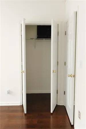 a view of a livingroom with wooden floor