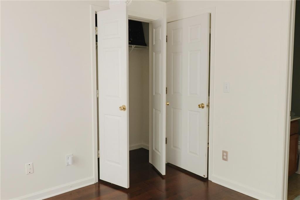 340 Timber Gate Court Lawrenceville, GA 30045 - Photo 21 of 26 a view of a hallway with wooden floor