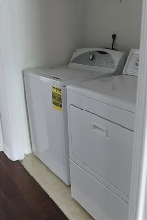 a utility room with washer and dryer