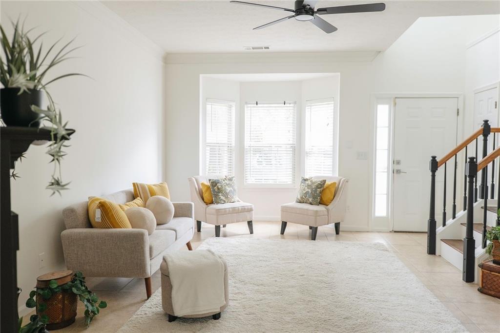 340 Timber Gate Court Lawrenceville, GA 30045 - Photo 5 of 26 a living room with furniture and a window