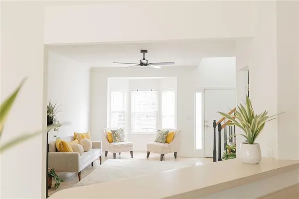 a living room with furniture and window