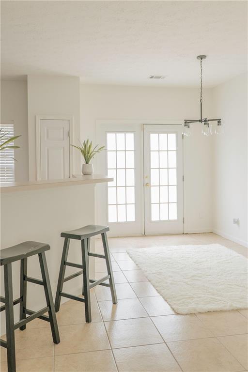 340 Timber Gate Court Lawrenceville, GA 30045 - Photo 10 of 26 a view of an empty room with a window