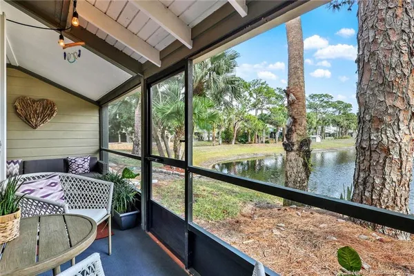 a view of a lake with a yard