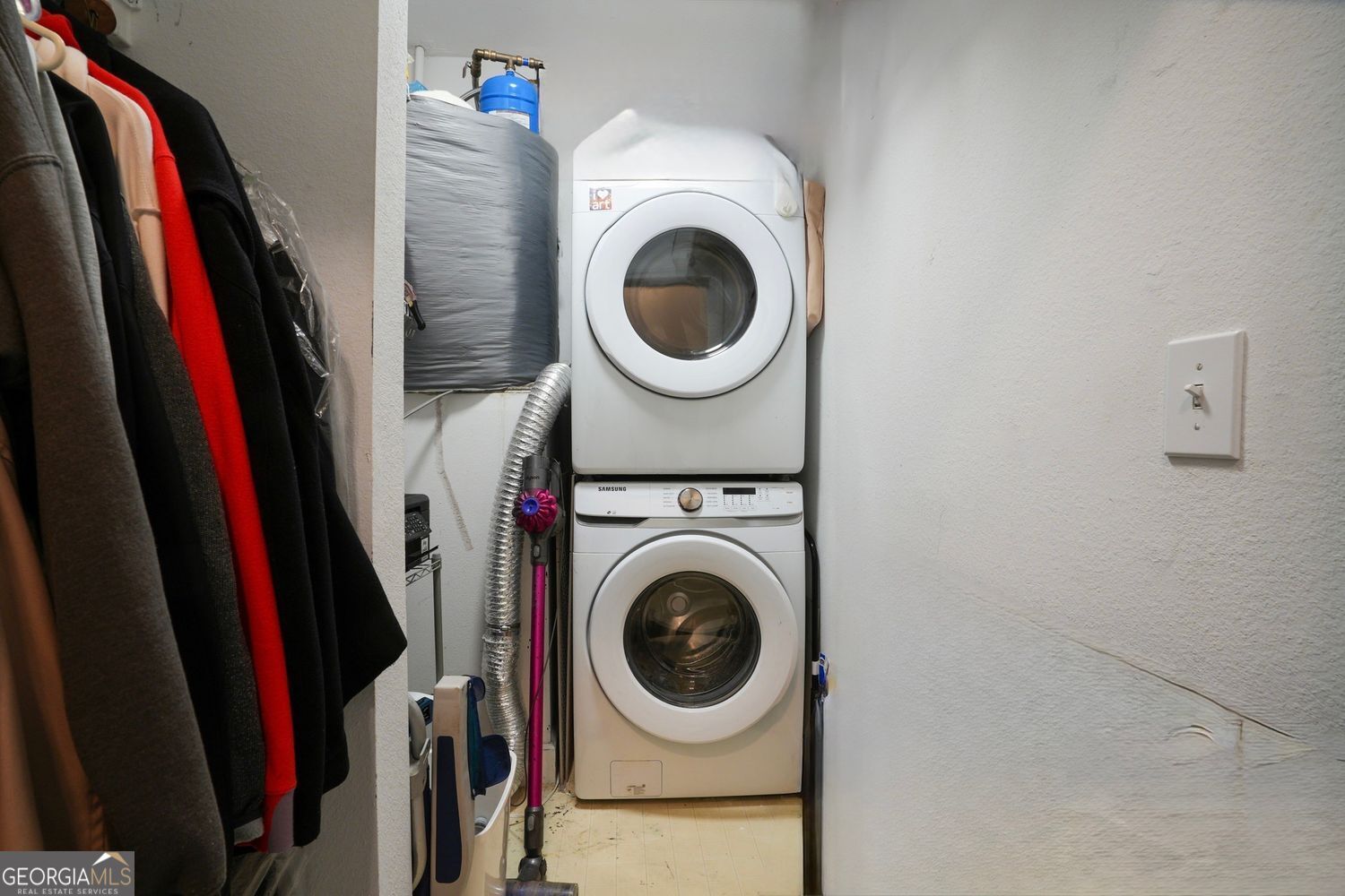 3777 Peachtree Road Northeast Brookhaven, GA 30319 - Photo 19 of 26 Dedicated Laundry Room with Stacked Washer and Dryer that Remain with the Property,